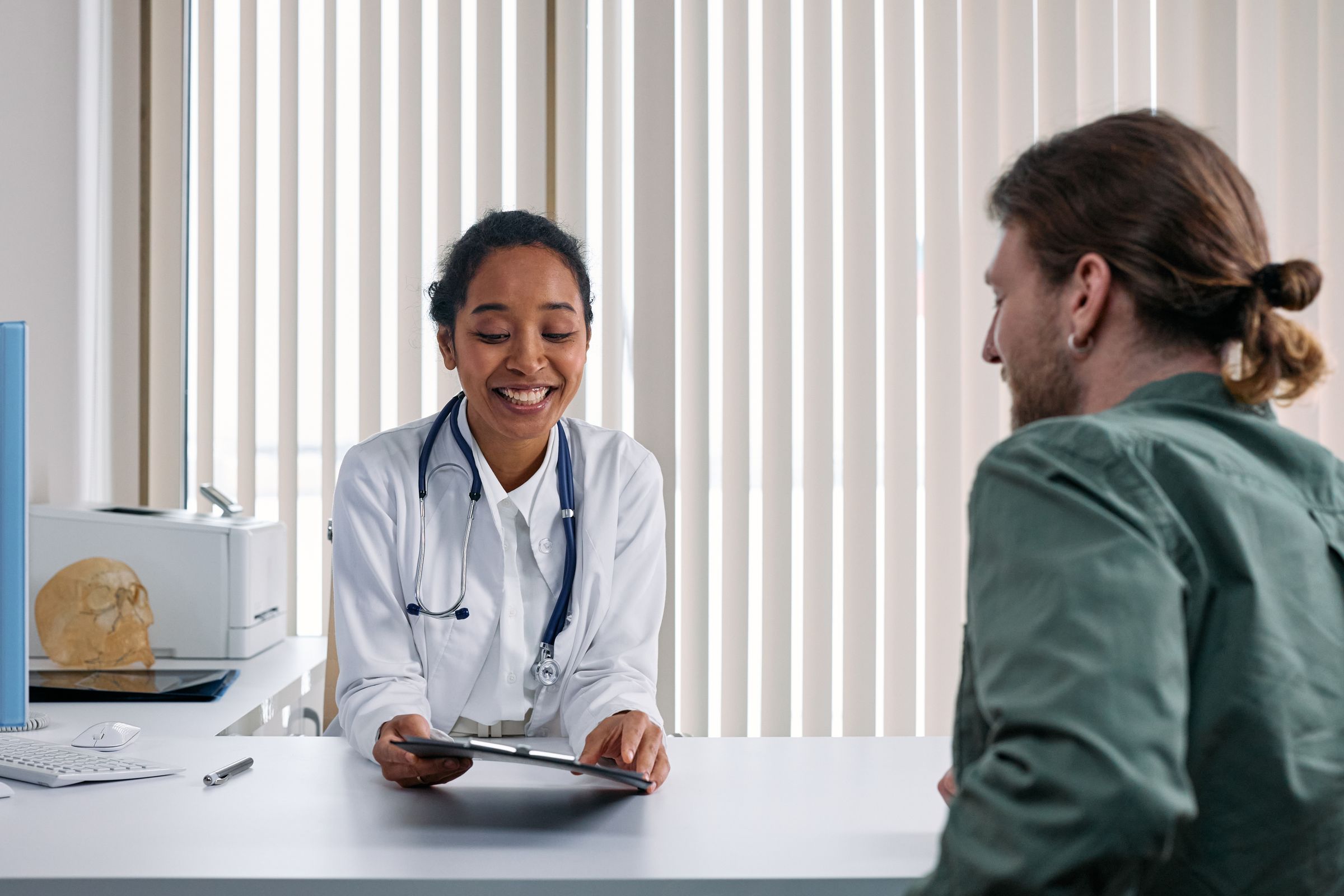 Medical provider discussing a personalized care plan with a patient